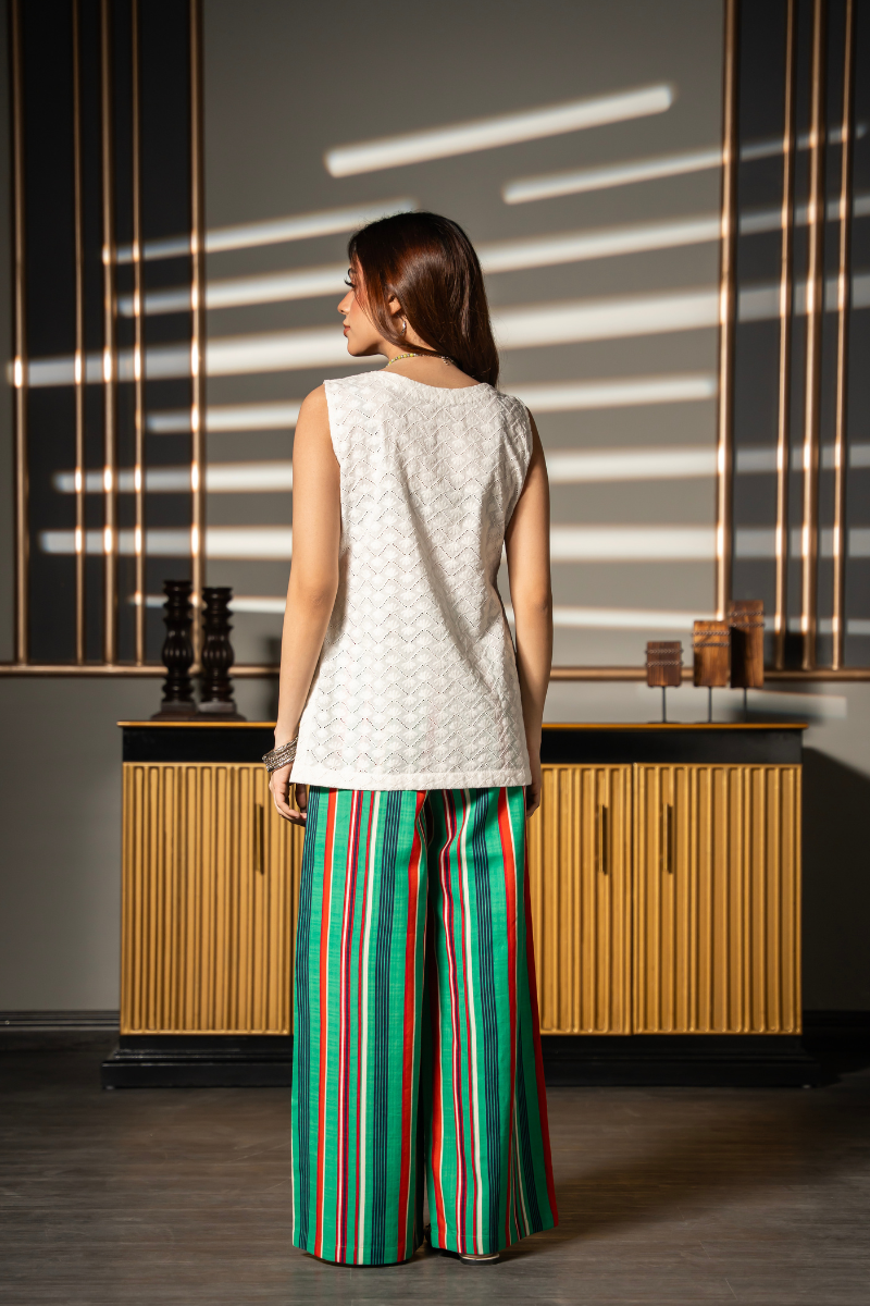 Daydream Set by Posheri, back view of white embroidered sleeveless top with green and red striped wide-leg pants