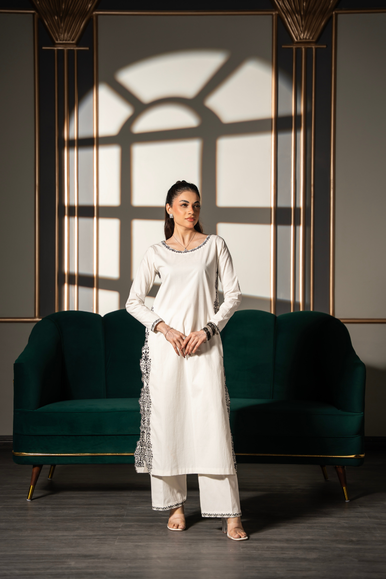 Noor Silhouette embroidered ivory cotton twill kurta and pant set by Posheri