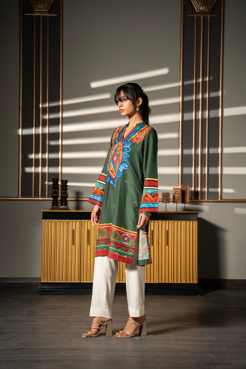 Three-quarter view of Green Fable printed kurta showing the straight silhouette and statement placement print by Posheri