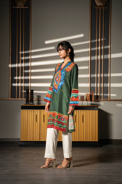 Three-quarter view of Green Fable printed kurta showing the straight silhouette and statement placement print by Posheri
