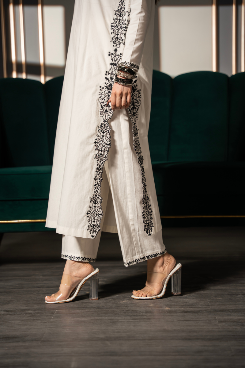 Noor Silhouette embroidered ivory cotton twill kurta and pant set by Posheri