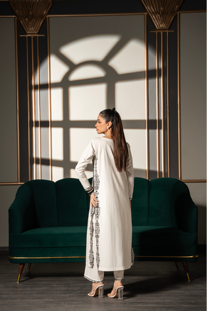 Noor Silhouette embroidered ivory cotton twill kurta and pant set by Posheri