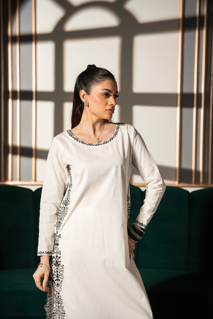 Noor Silhouette embroidered ivory cotton twill kurta and pant set by Posheri