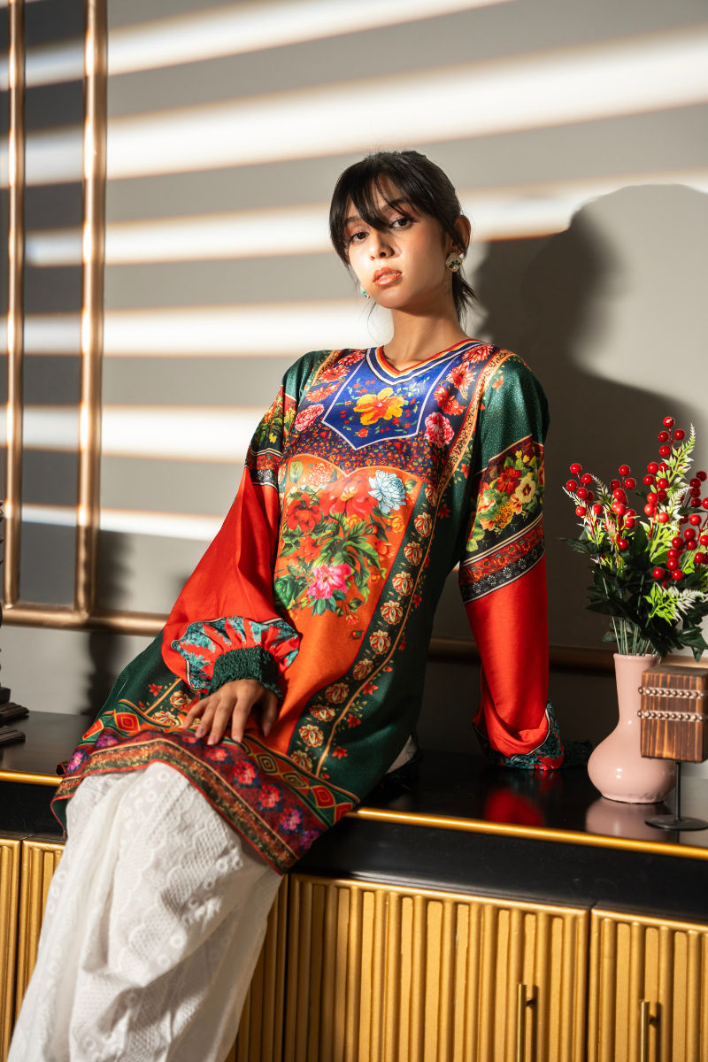 Lifestyle view of Floral Folklore emerald green printed kurta with colorful floral print and orange balloon sleeves by Posheri