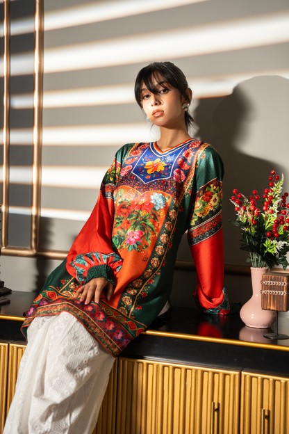 Lifestyle view of Floral Folklore emerald green printed kurta with colorful floral print and orange balloon sleeves by Posheri