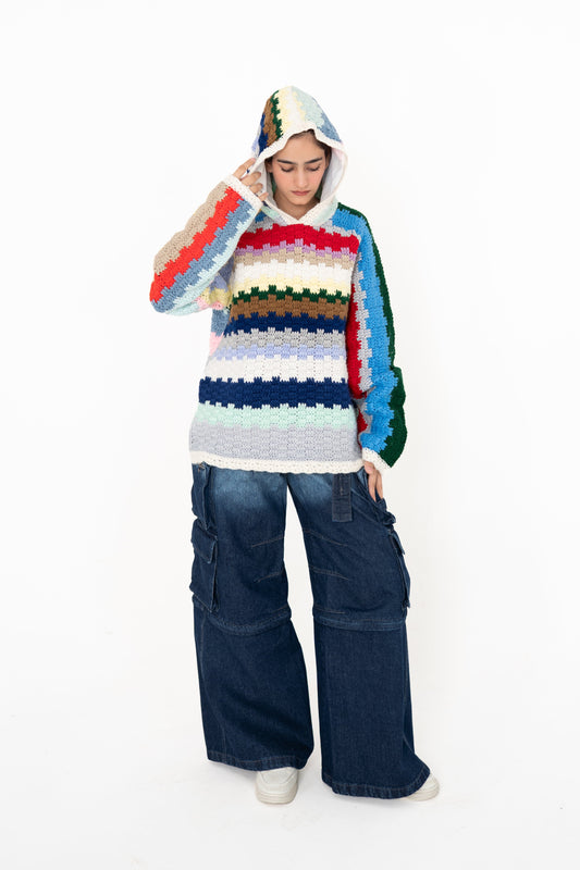 Colour Out Loud multicolour crochet hoodie worn with the striped hood up, front view