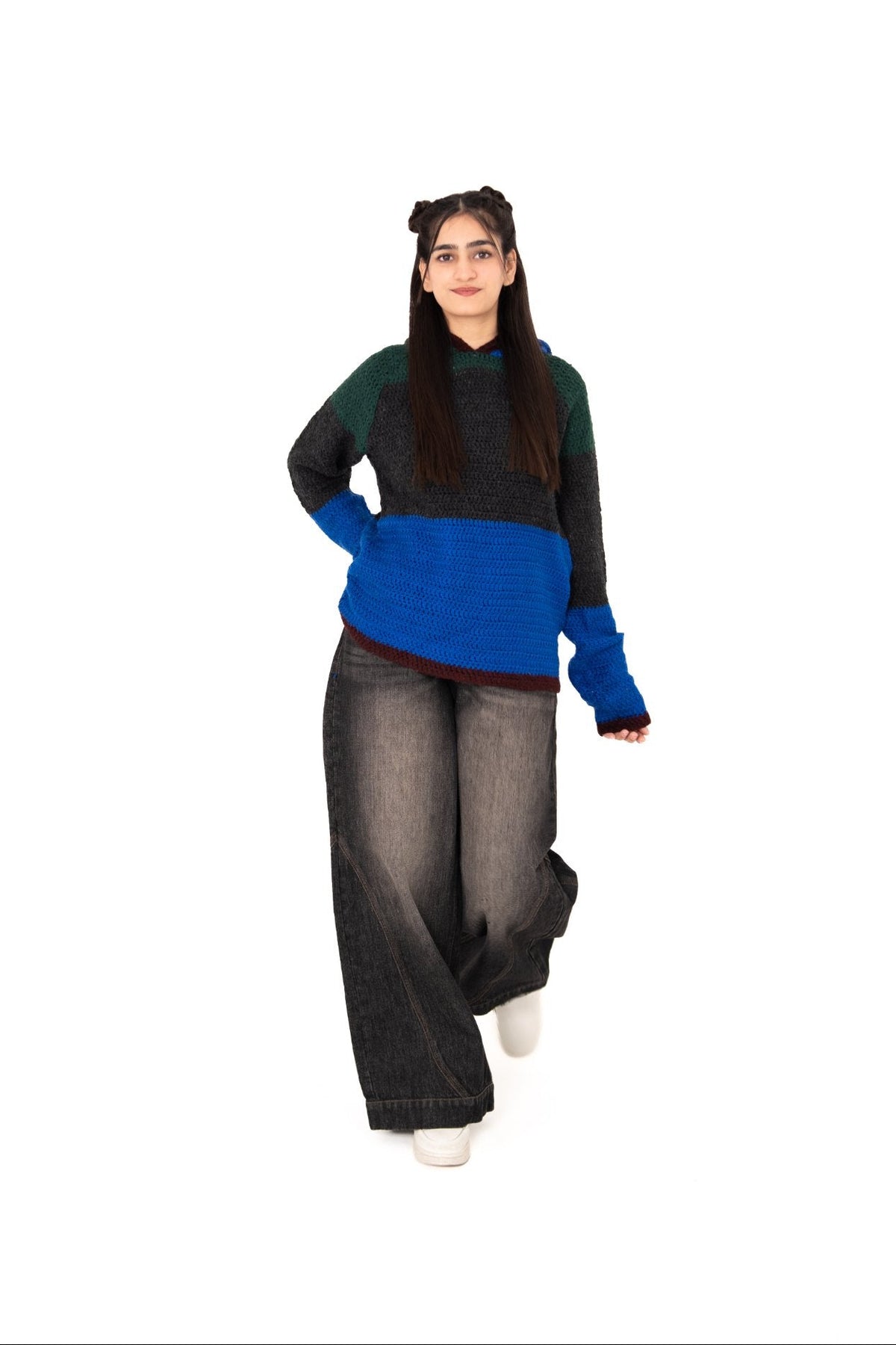 Dark Mode colour-block crochet hoodie, model walking in wide-leg washed black jeans