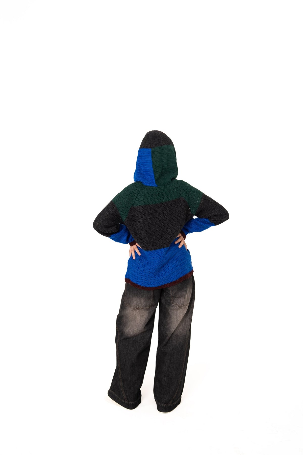 Dark Mode crochet hoodie back view with hood up showing green, charcoal and blue colour blocks