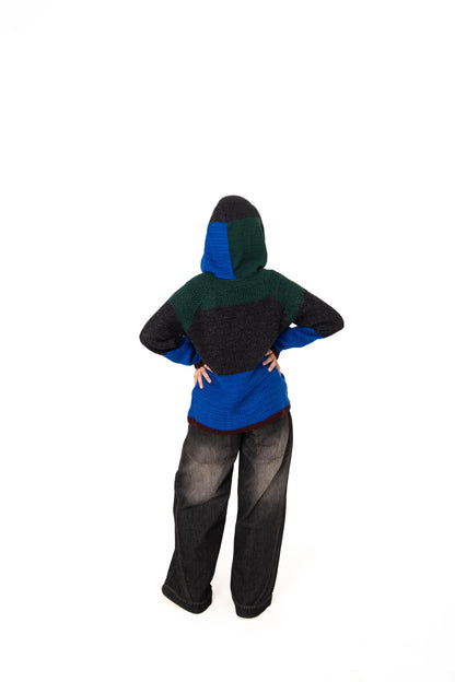 Dark Mode crochet hoodie back view with hood up showing green, charcoal and blue colour blocks