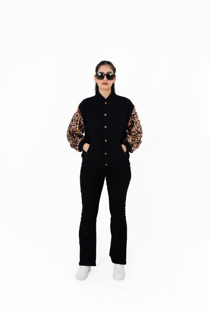 Gilt Trip black varsity jacket with bronze-gold sequinned sleeves, front view – POSHERI Outer Control