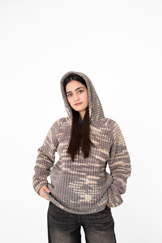 Model wearing Grey Area grey, charcoal and cream textured crochet hoodie with the hood up – POSHERI Loop de Loop