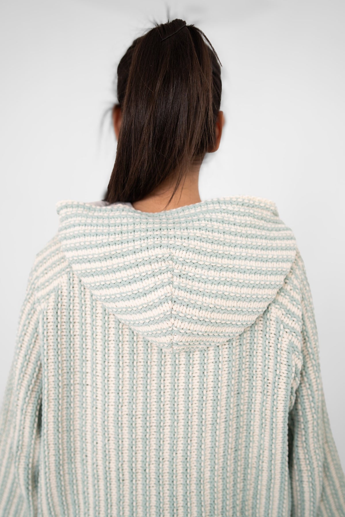 Mint Condition crochet hoodie back close-up of the striped hood