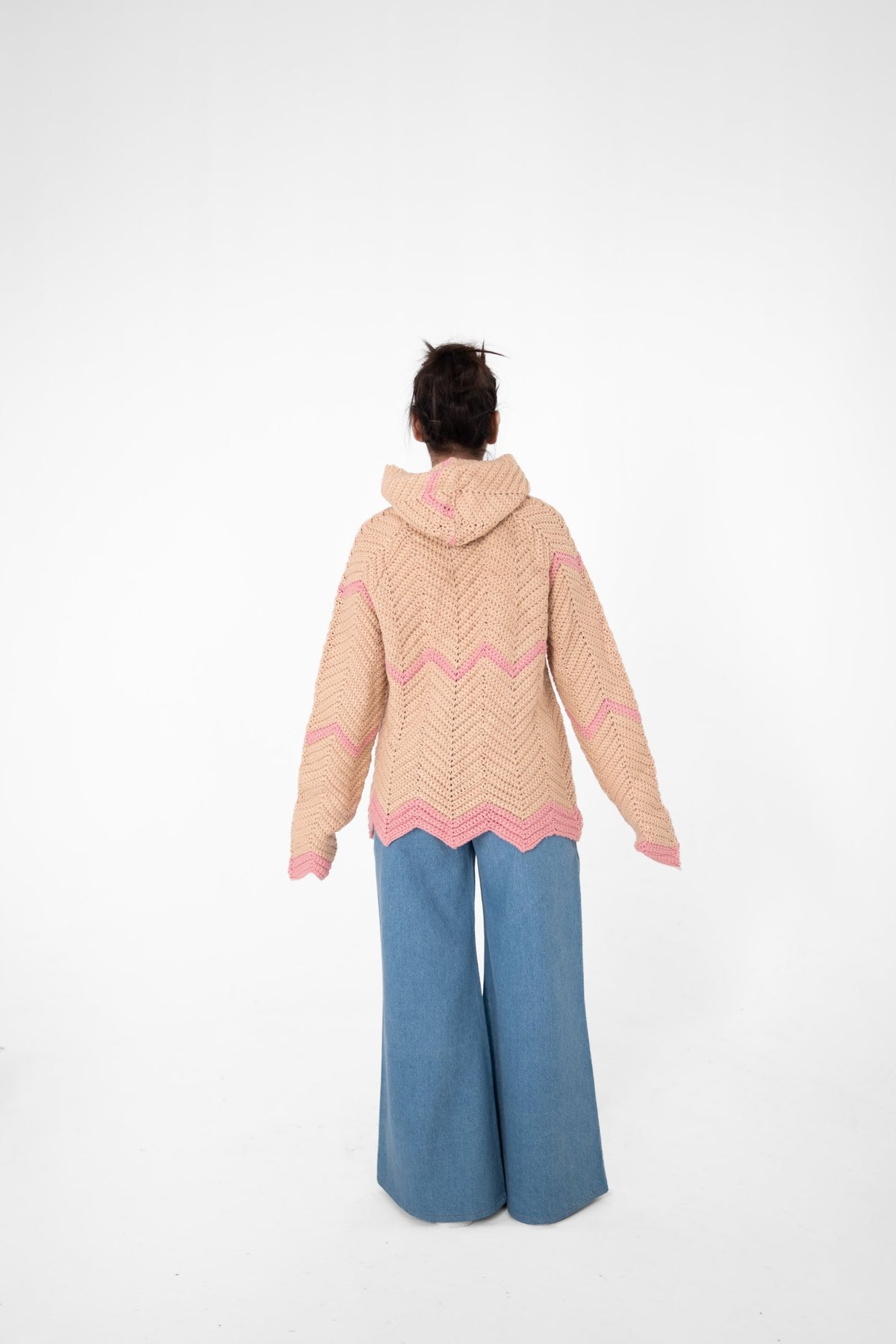 Pink Plot Twist beige and pink chevron crochet hoodie, back view with zigzag pink hem – POSHERI Loop de Loop