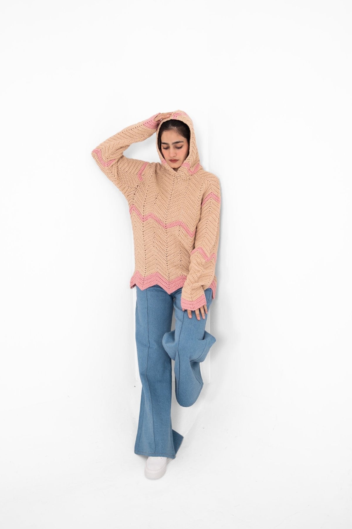 Pink Plot Twist beige and pink chevron crochet hoodie worn with the hood up, full length – POSHERI Loop de Loop