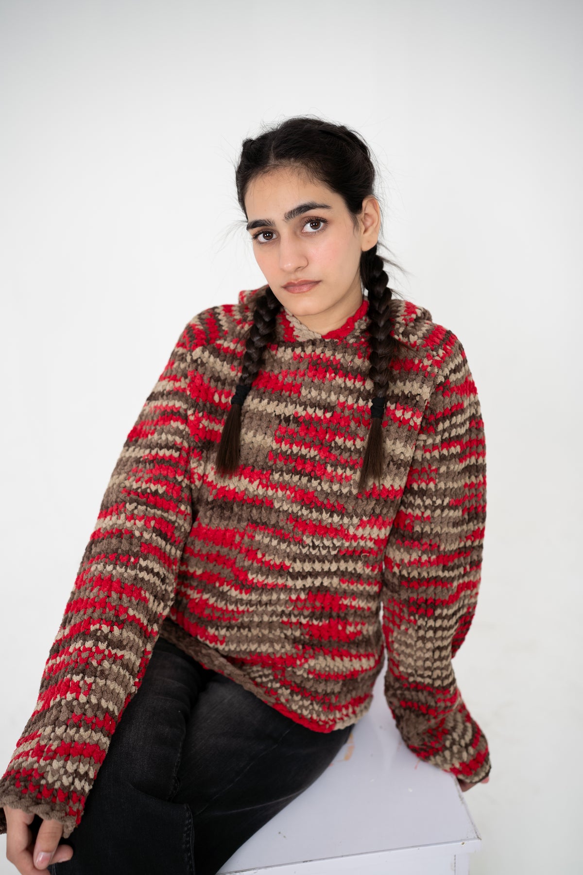 Close-up of Red Signal multitone crochet hoodie in vibrant red and warm earthy tones – POSHERI