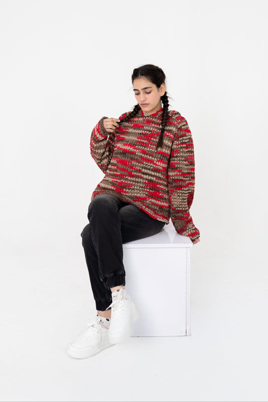 Model seated wearing Red Signal red multitone handmade crochet hoodie – POSHERI Loop de Loop