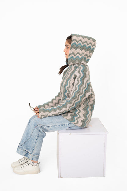 Tidal Shift sage and blue chevron crochet hoodie, side view with hood up – POSHERI